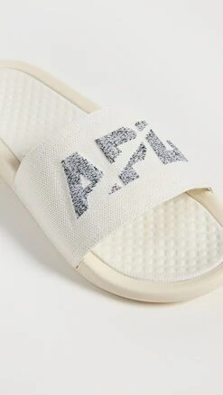 APL: Athletic Propulsion Labs Big Logo TechLoom Slides 9 APL: Athletic Propulsion Labs Big Logo TechLoom Slides -Shopbop plabs310271f318 1676399672993 2 0. UX357 QL90